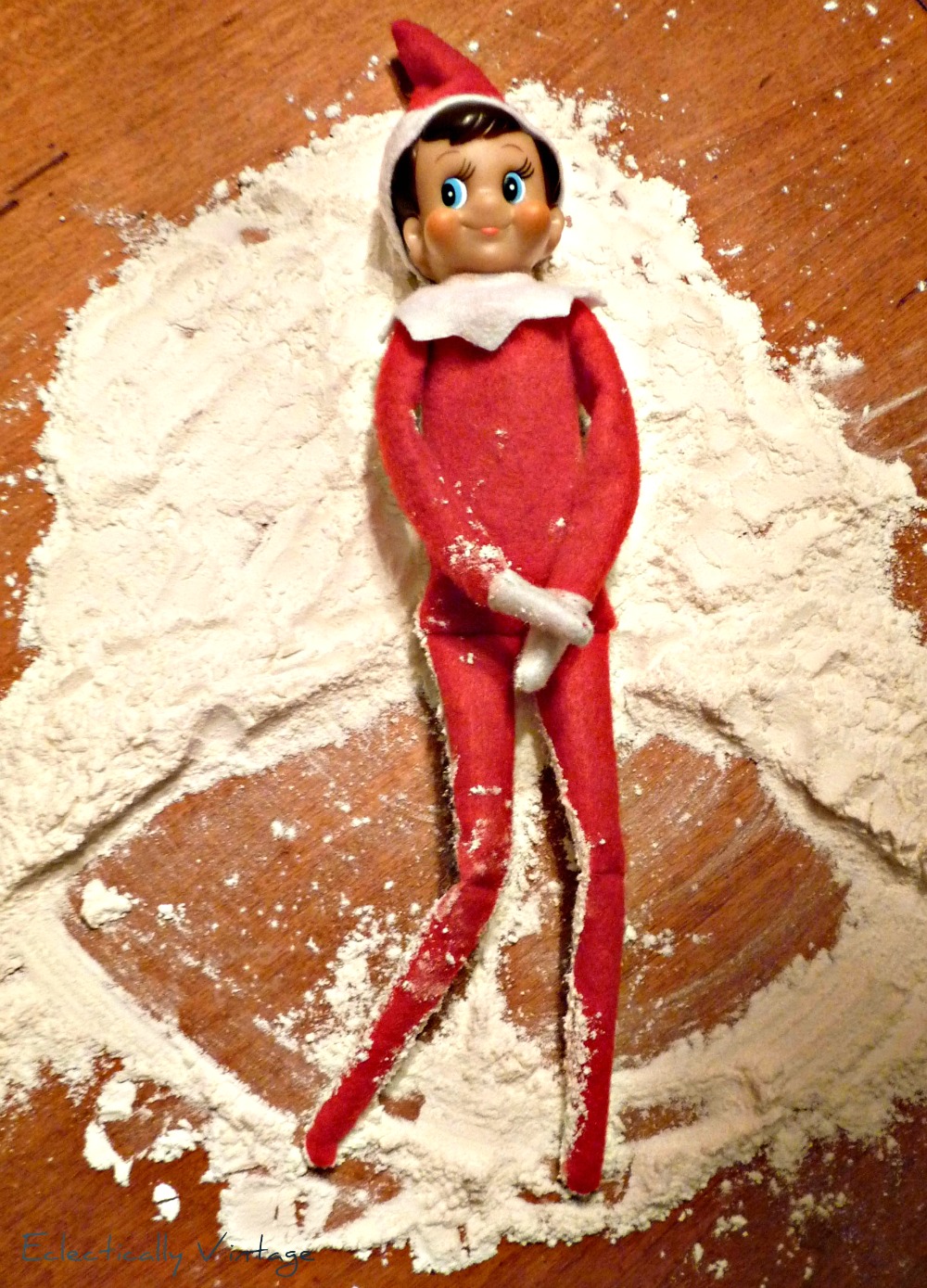 Creative Elf on the Shelf Ideas - fun Snow Angel - #elfontheshelf kellyelko.com