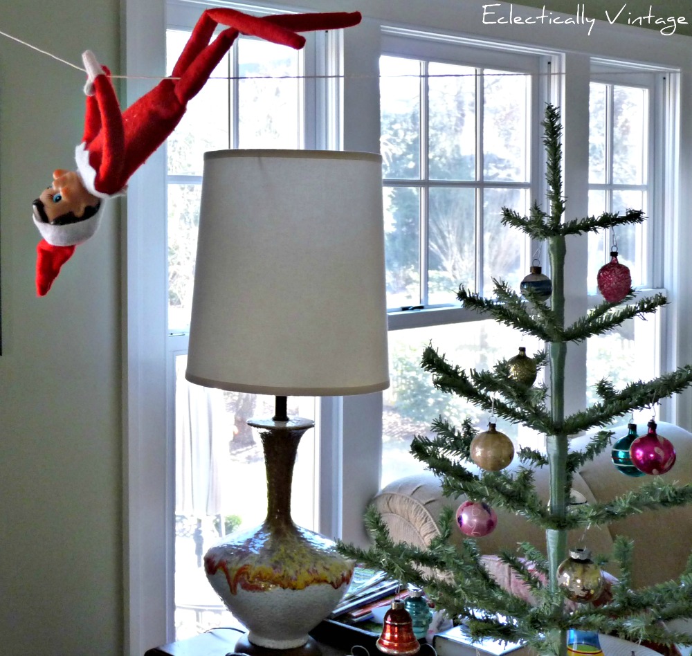 Creative and hysterical Elf on the Shelf ideas - this elf has fun zip lining across the room! kellyelko.com