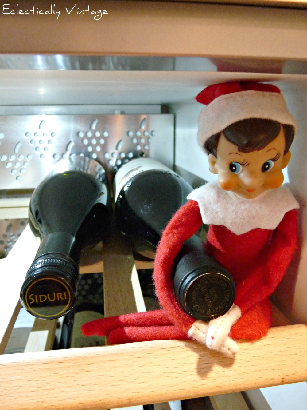 18 Hysterical Elf on the Shelf ideas! #elfontheshelf kellyelko.com This little Elf on the Shelf got into the wine fridge! 