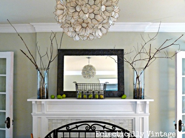 Fall mantel - love the branches in glass vases kellyelko.com #fall #fallmantel #falldecor 