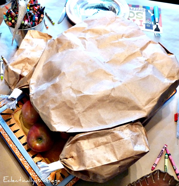 Thanksgiving Crafts for Kids - how to make a paper bag Thanksgiving turkey with a popcorn surprise inside kellyelko.com #thanksgiving #thanksgivingcrafts #fallcrafts #thanksgivingdecor #thanksgivingcenterpiece #kidscrafts #diythanksgiving 