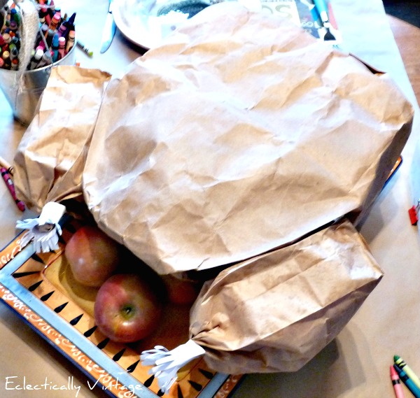 Thanksgiving Crafts for Kids - how to make a paper bag Thanksgiving turkey with a popcorn surprise inside kellyelko.com #thanksgiving #thanksgivingcrafts #fallcrafts #thanksgivingdecor #thanksgivingcenterpiece #kidscrafts #diythanksgiving 
