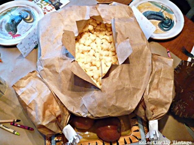 Thanksgiving Crafts for Kids - how to make a paper bag Thanksgiving turkey with a popcorn surprise inside kellyelko.com #thanksgiving #thanksgivingcrafts #fallcrafts #thanksgivingdecor #thanksgivingcenterpiece #kidscrafts #diythanksgiving 