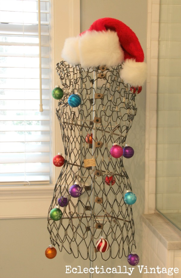 Creative Christmas decorating ideas - vintage dress form filled with ornaments kellyelko.com