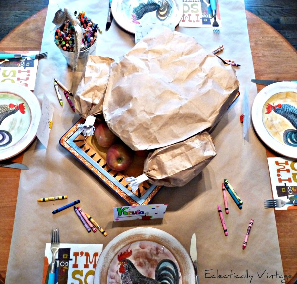 Make a paper bag turkey for Thanksgiving! So much for for the kids table and wait until you see what's inside when you "carve" it. kellyelko.com #thanksgiving #thanksgivingcrafts #idsthanksgiving #turkey #fallcrafts #kidstable #papercrafts