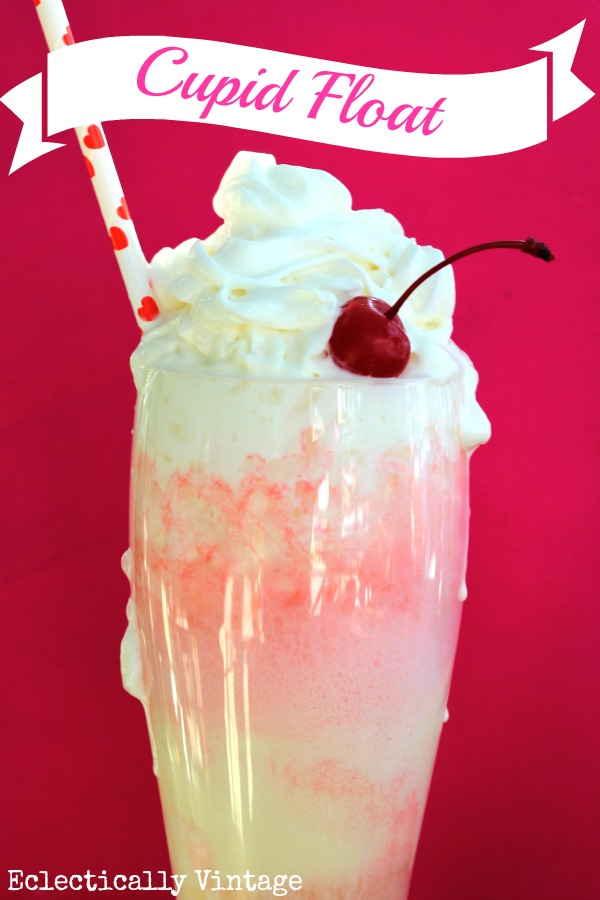Cupid Float Valentine Drink - how fun & perfect for the kids! kellyelko.com #valentine #valentinesrecipe #valentinesday #valentinesparty #kidsvalentine #kidsdrinks #kidsrecipes #recipes #cupidfloat