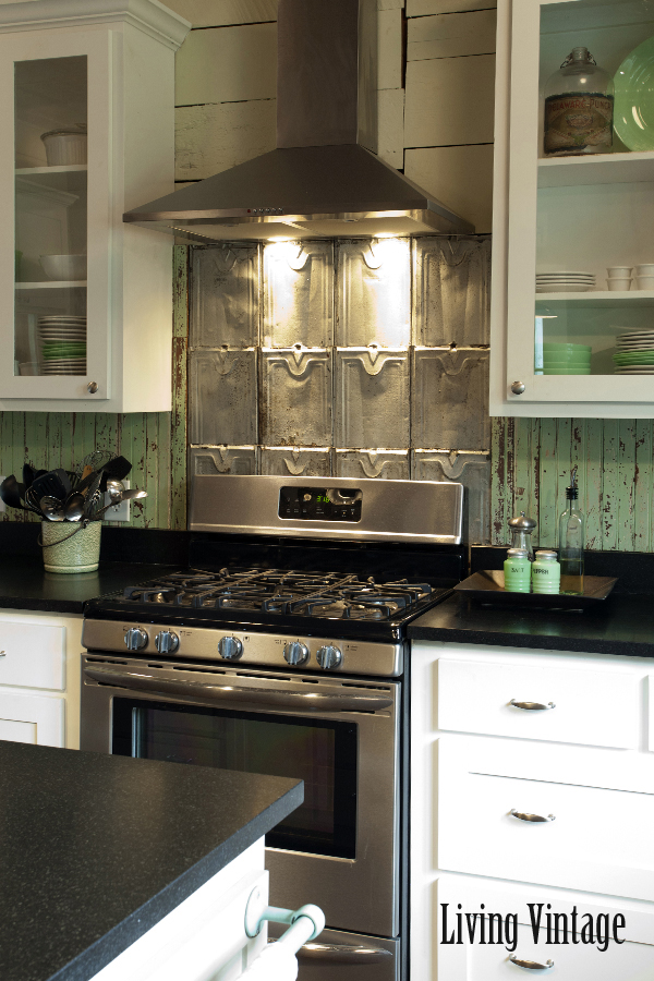 Metal backsplash adds a vintage touch to this kitchen