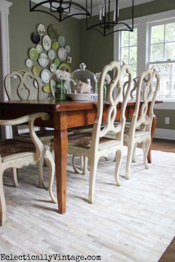 Love the pieced cowhide in this eclectic dining room kellyelko.com