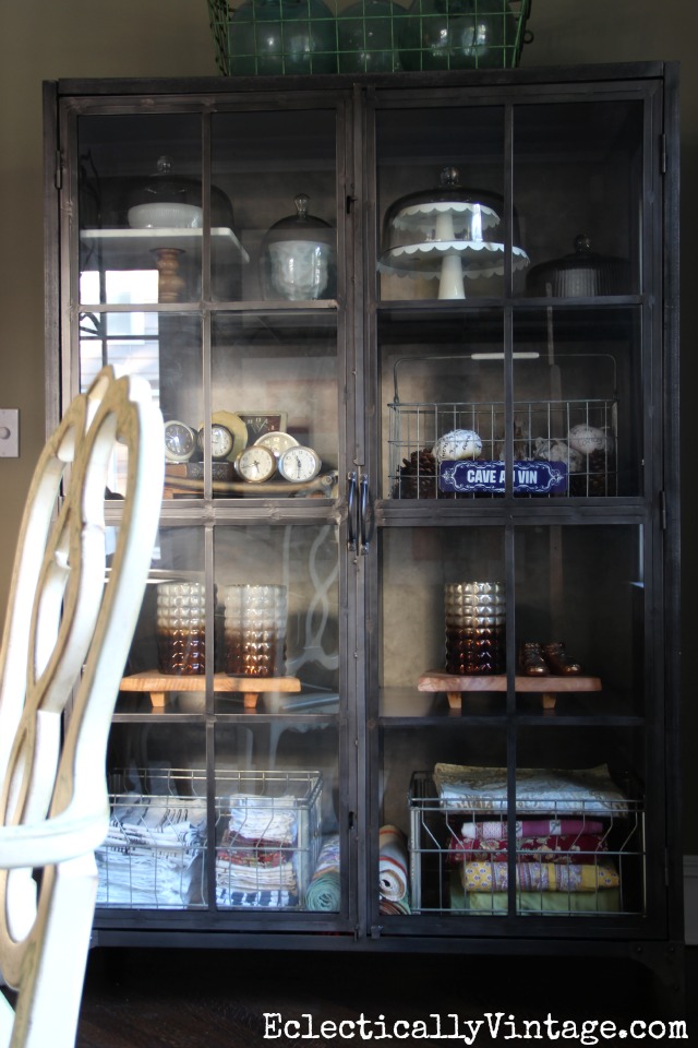 I love this industrial metal cabinet - perfect for showing off collections kellyelko.com