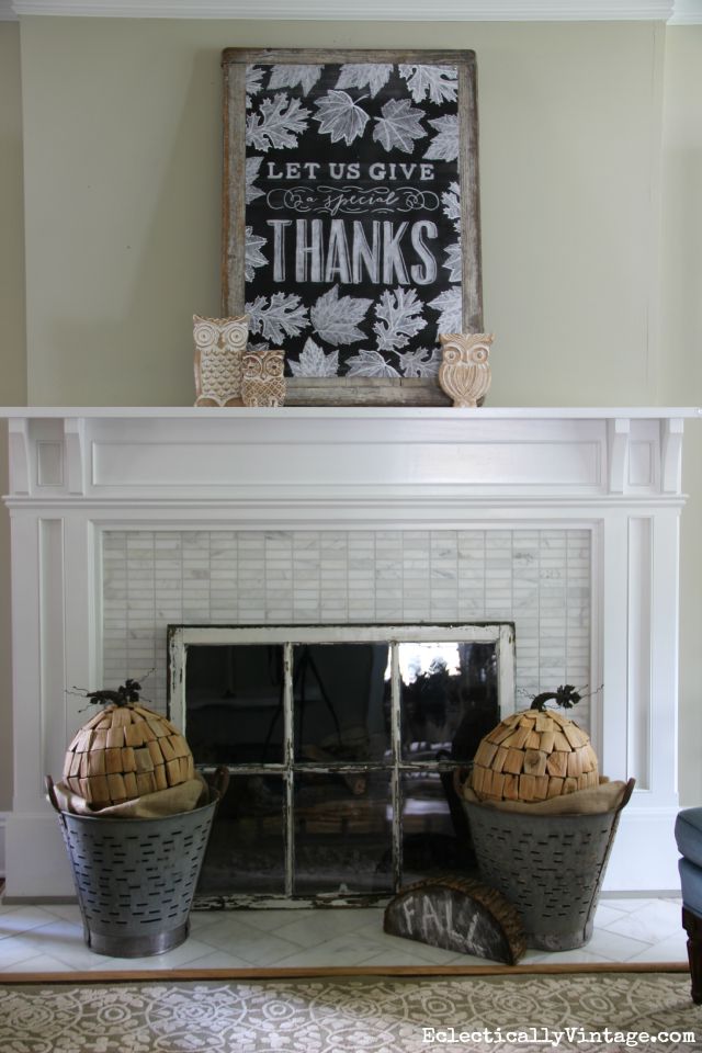 8 Unique Fall Mantel Decorating Ideas - love the printable chalk art and the window used a fireplace screen kellyelko.com #fall #falldecor #falldecorating #fallmantel #farmhousemantel #farmhousedecor #farmhousestyle #eclecticstyle #thrifted 