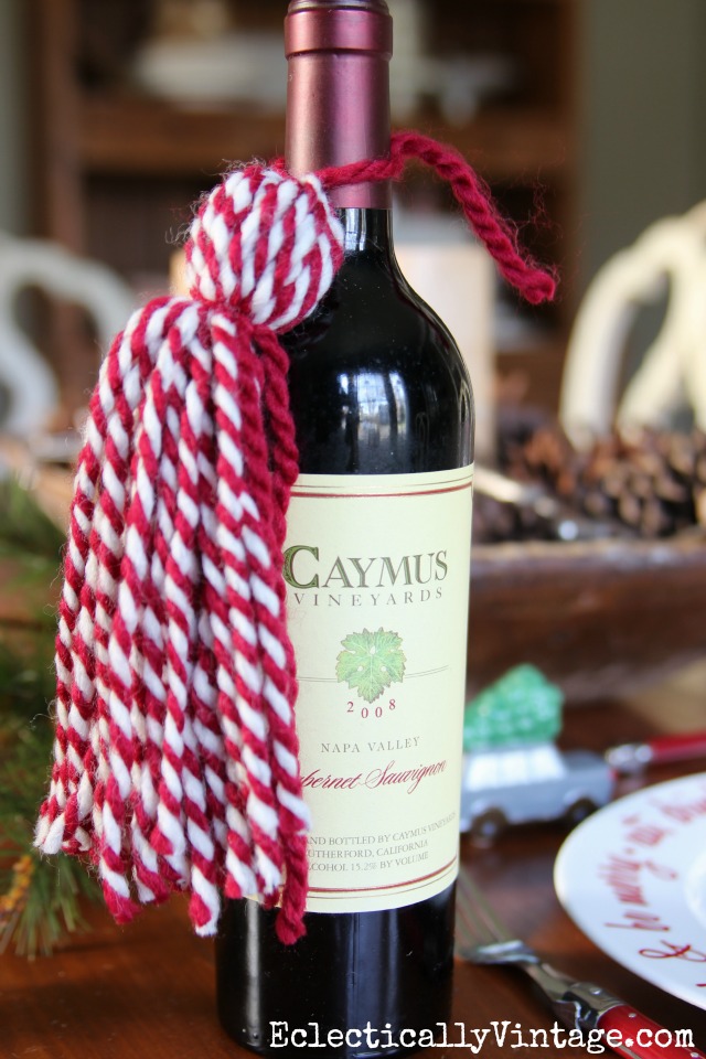 Creative Gift Wrap Ideas - unique ways to wrap presents for a WOW factor like these giant yarn tassels kellyelko.com