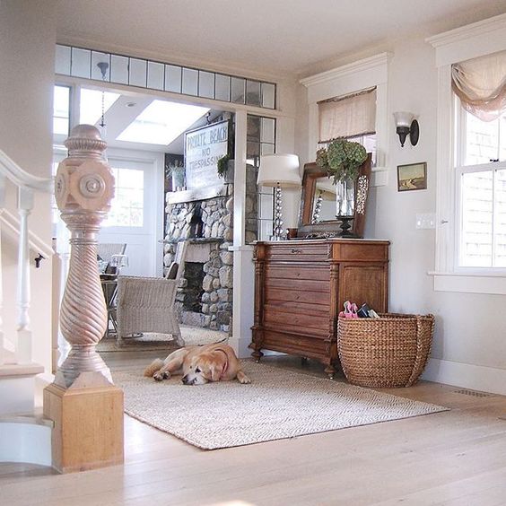 Love the antique newel post in this coastal home tour kellyelko.com