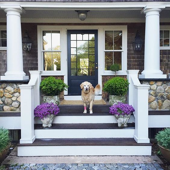 Classic stone and wood coastal porch kellyelko.com