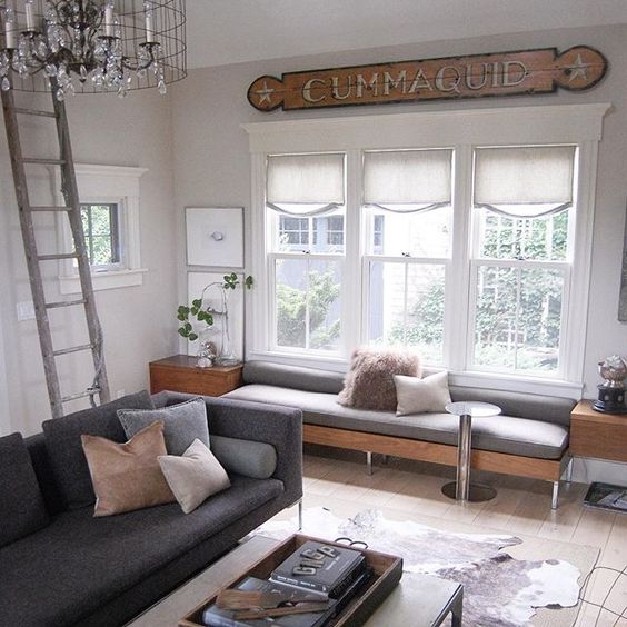 Old sign adds character to this modern family room kellyelko.com