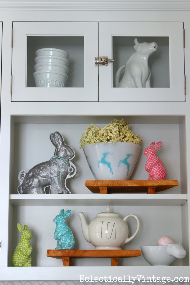 Spring decor - love the colorful bunnies and the vintage gazelle bowl kellyelko.com #spring #springdecor #springdecorating #springcrafts #hometour #housetour #eclectichome #farmhousedecor #fixerupperstyle #jadeite #farmhousestyle #vintagedecor #vintagehome #kellyelko #easterdecor #whitekitchen #shelfie #springbunnies #vintagedecor