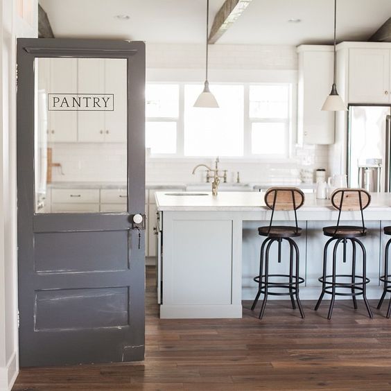 Use an antique door for a pantry door 