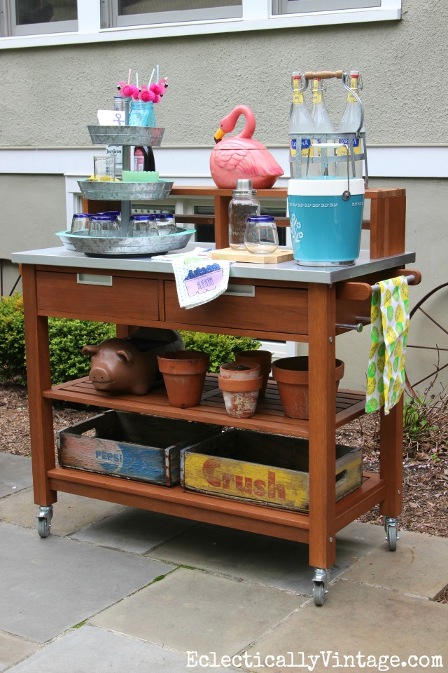 Simple Gardening Ideas - a potting table does double duty as a bar cart/serving area kellyelko.com #patio #patiodecor #pottingbench #gardening #vintagedecor 