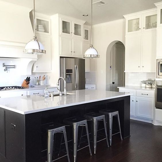 Black and white kitchen - love the galvanized stools kellyelko.com