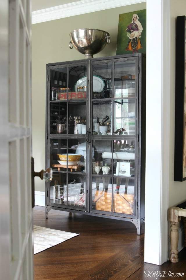 Love this metal industrial cabinet for storage kellyelko.com