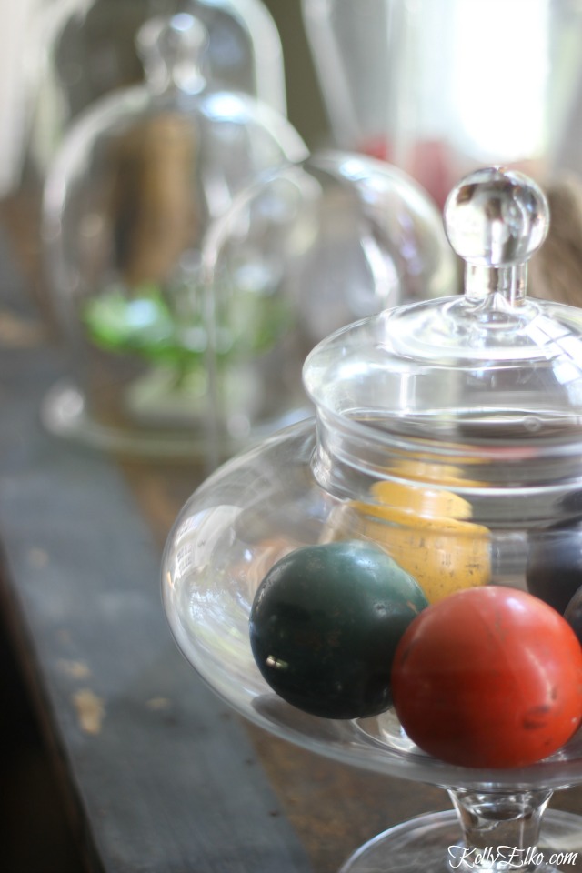 Vintage croquet balls in a glass jar kellyelko.com