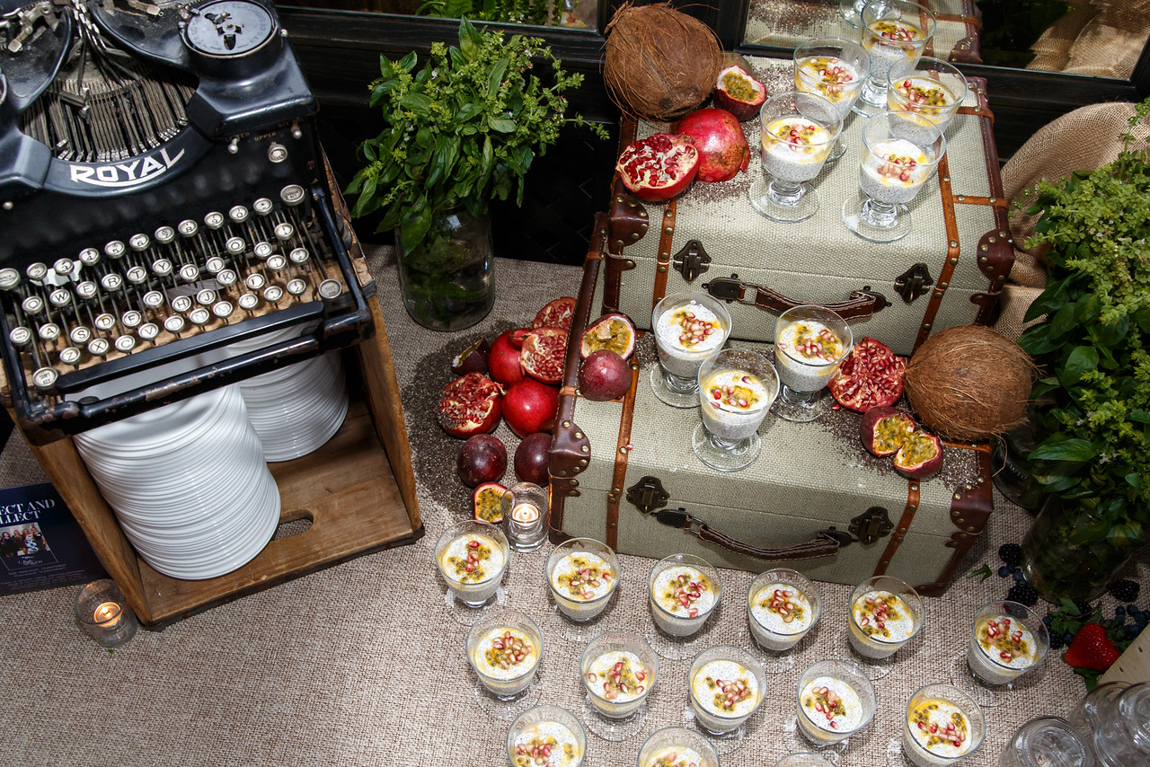 Vintage buffet display - love the old suitcases and typewriter kellyelko.com