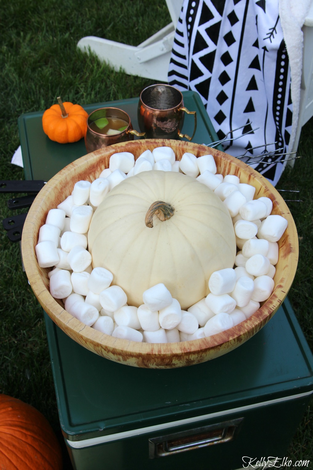 Fall s'mores bar - love this big wood bowl filled with marshmallows and a big pumpkin kellyelko.com