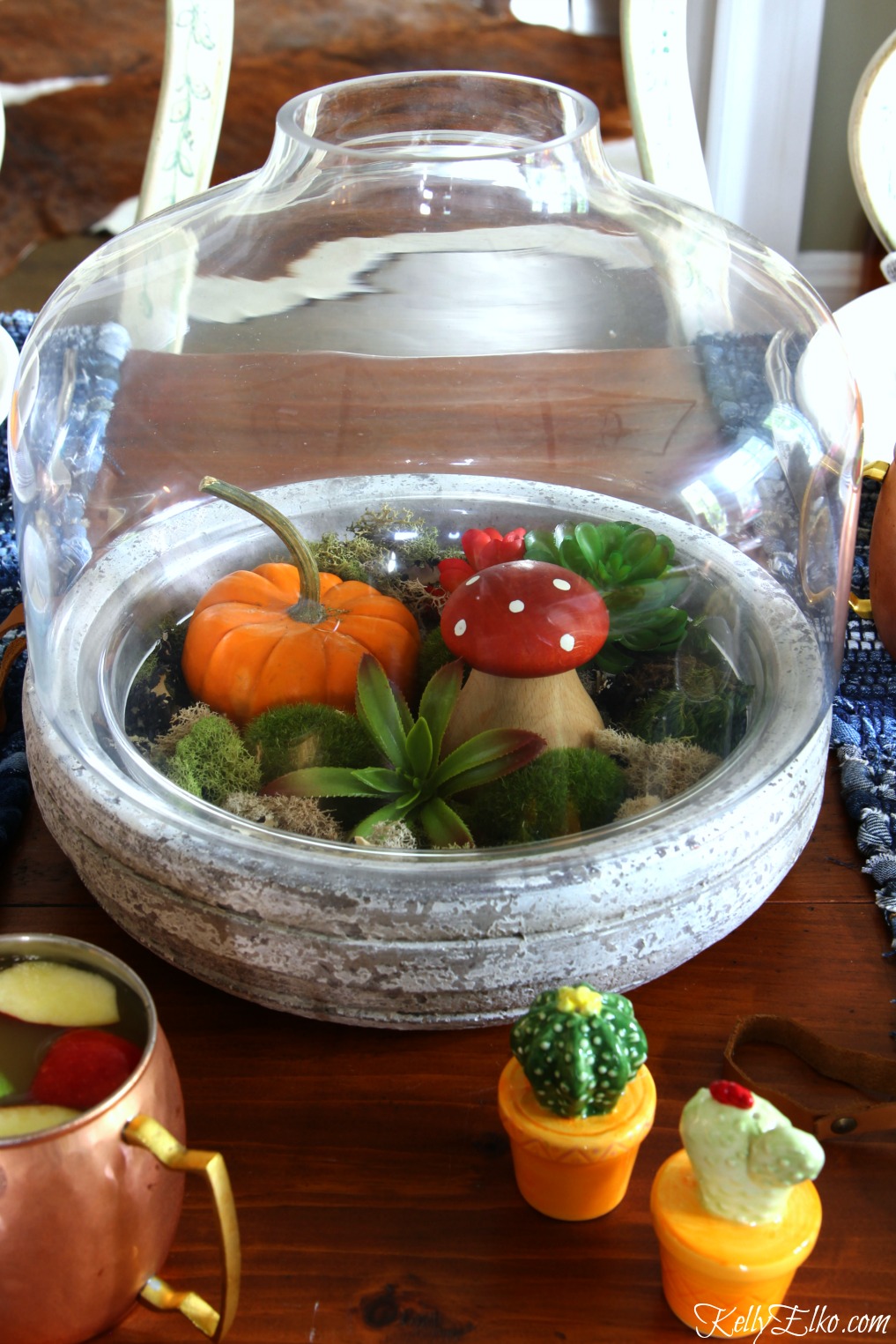 Love this fall terrarium centerpiece kellyelko.com