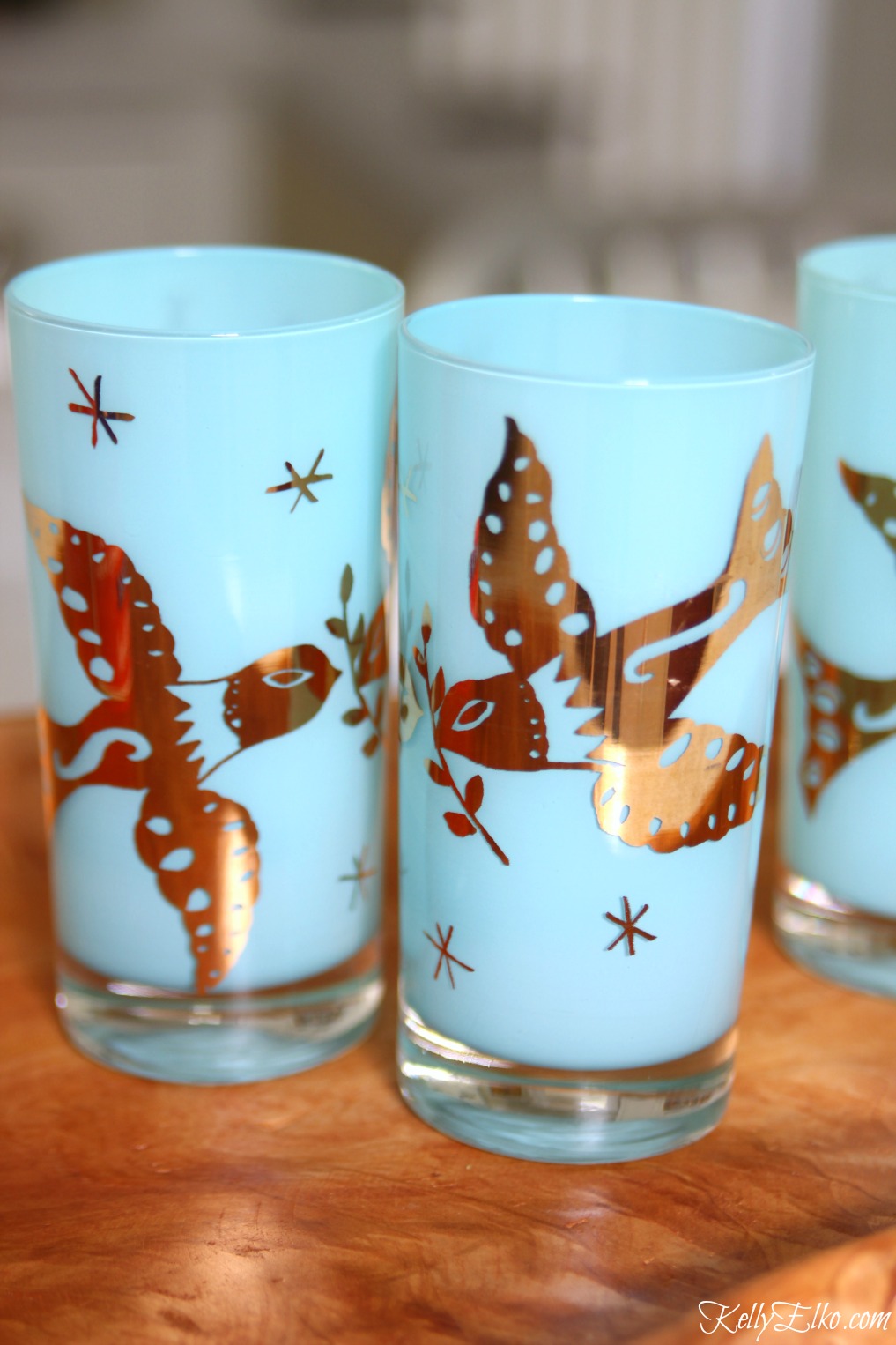 Mid century drinking glasses - love the vibrant blue with gold doves kellyelko.com