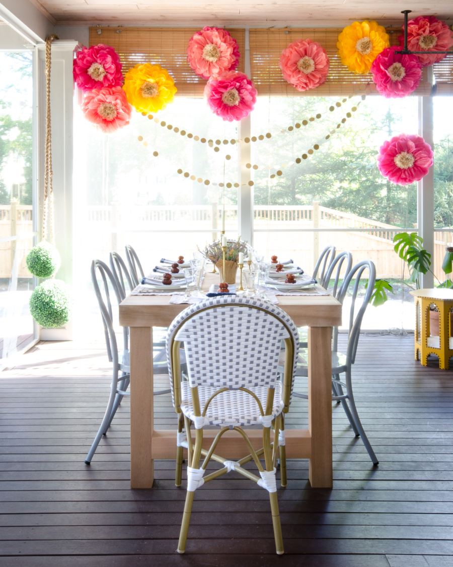 Love this colorful screened in porch with bentwood chairs 