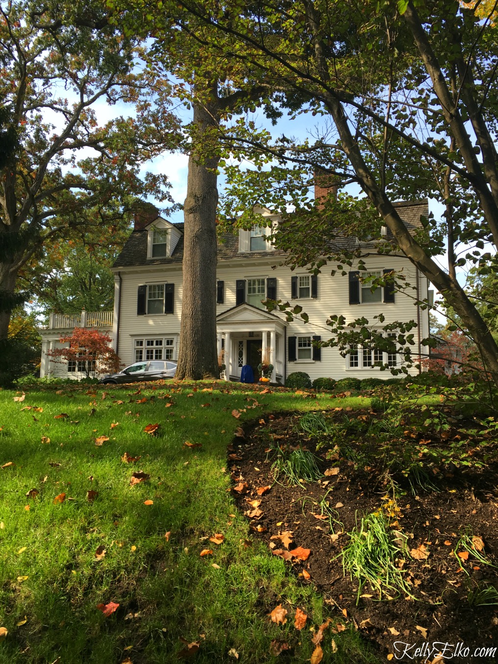 White house with black shutters - see more fall homes with curb appeal kellyelko.com