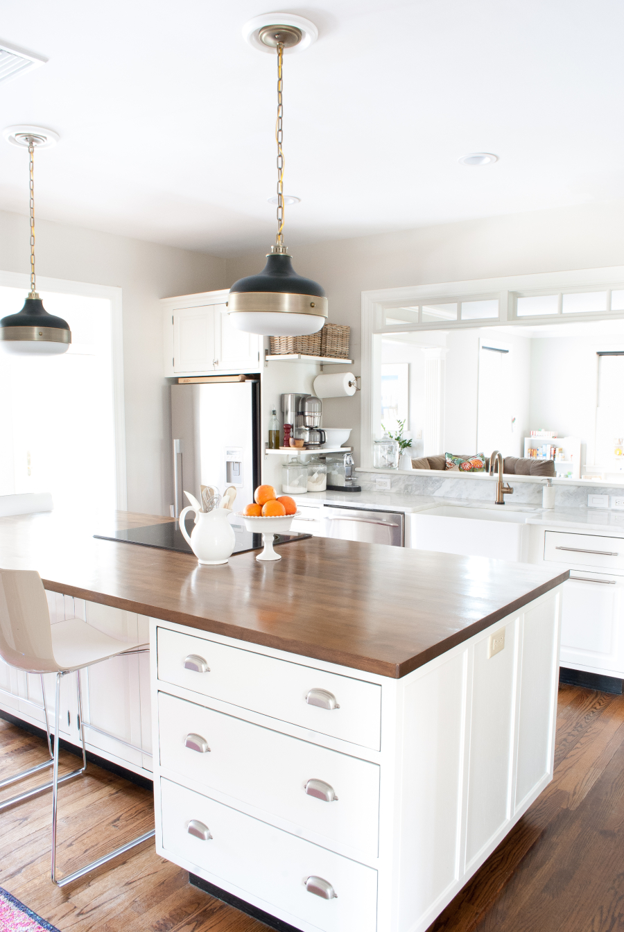 White kitchen with wood countertops 