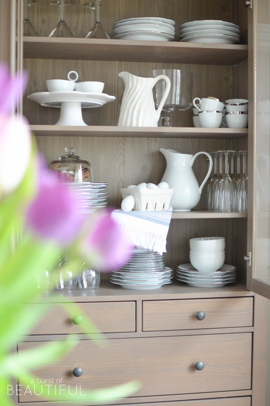 Love this hutch filled with white china