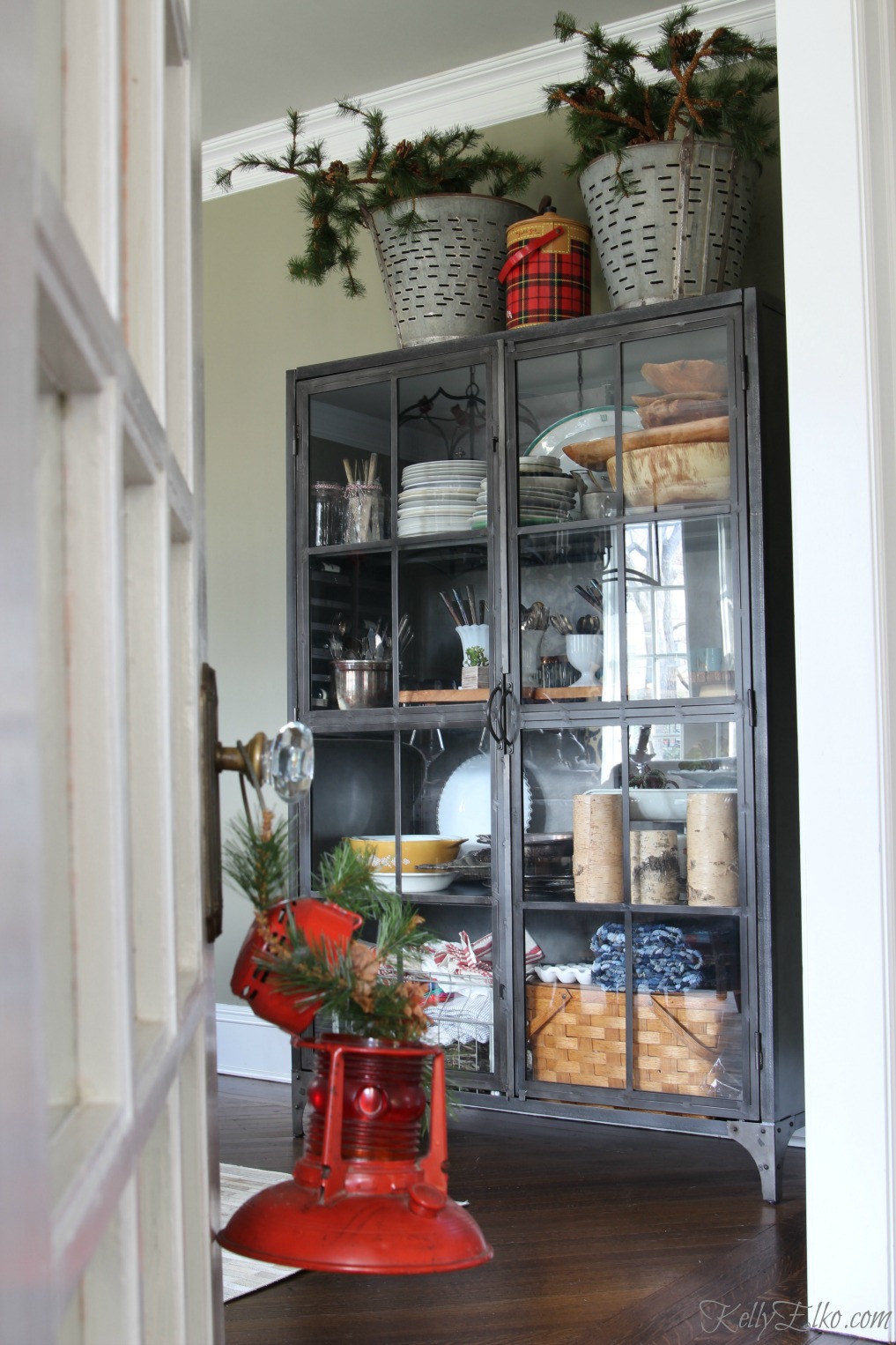 Love this industrial metal cabinet with glass for displaying favorites kellyelko.com