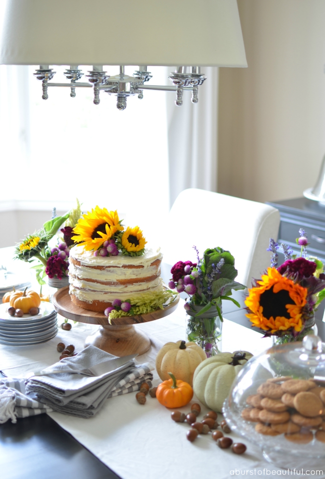 Overflowing fall centerpiece - love the naked cake 