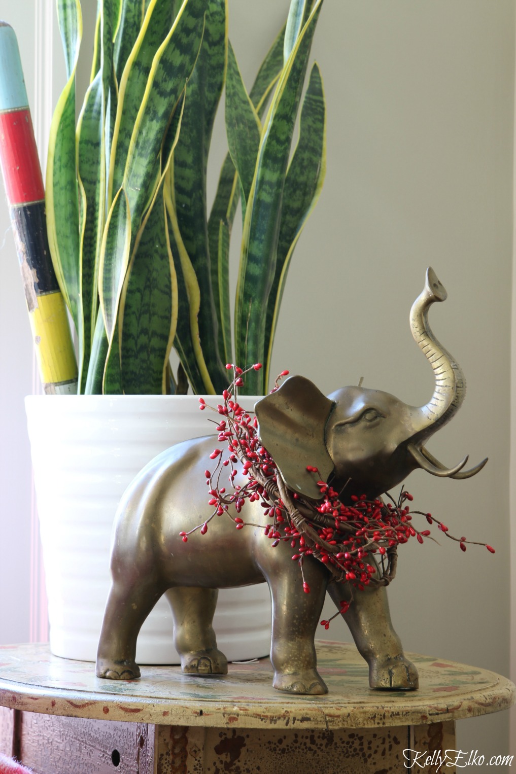 Vintage brass elephant dressed up for Christmas kellyelko.com