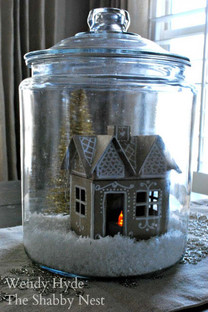 Paper mache gingerbread houses in jars