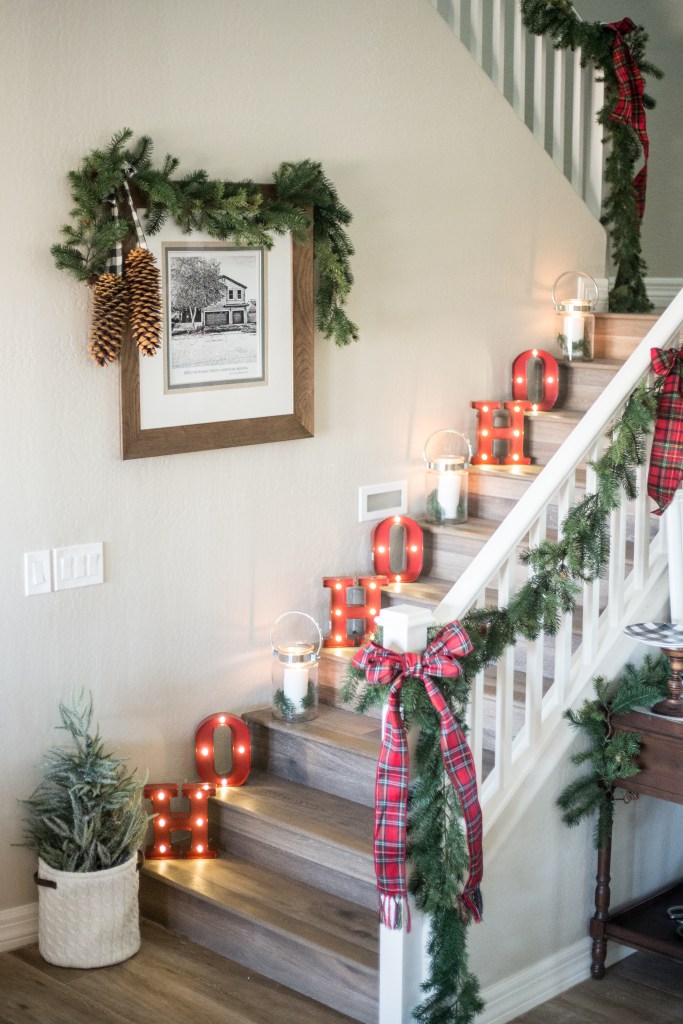 Ho Ho Ho marquee lights on Christmas staircase 