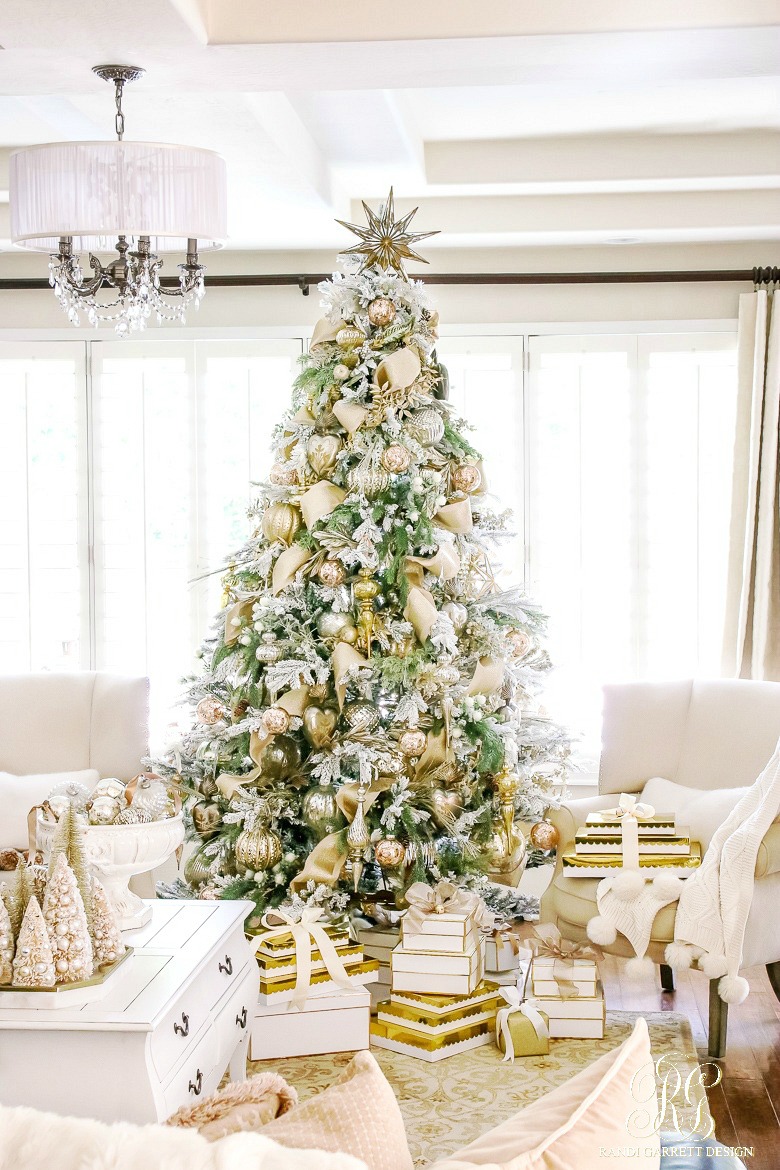 Love this metallic Christmas tree with gold gift wrap