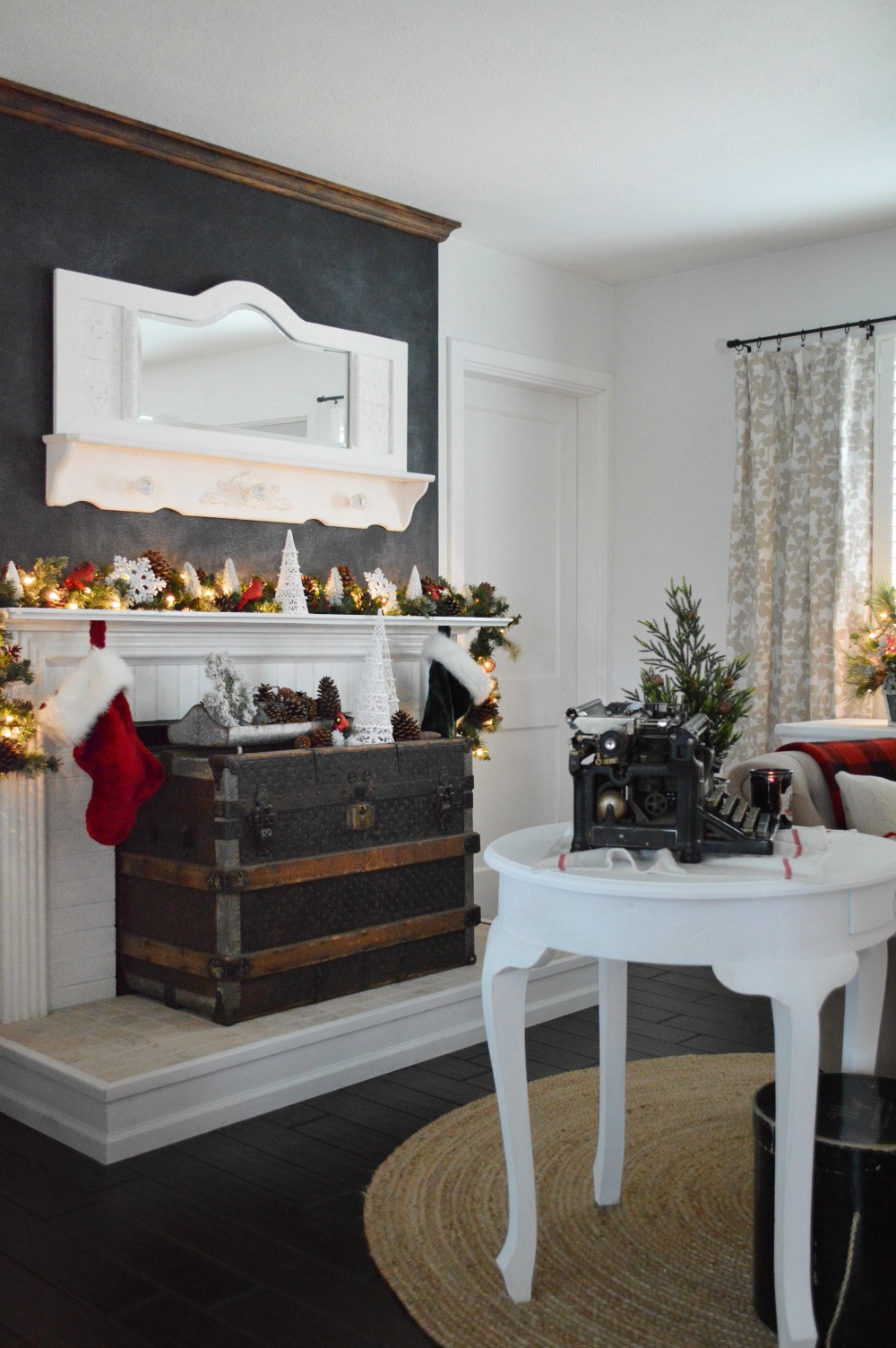 Love the chalkboard fireplace wall and the old trunk on the hearth