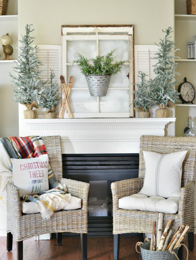 Christmas mantel with old windows and mini trees