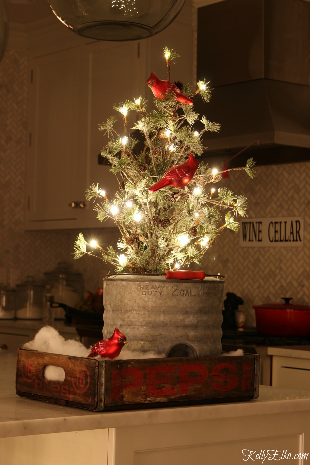 Christmas Lights at Night Home Tours - 35 homes by the glow of light - love this cute mini tree in vintage soda crate kellyelko.com