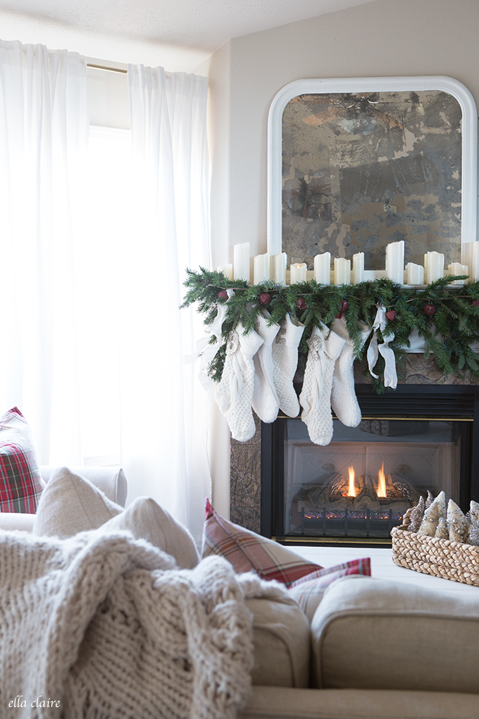 Simple Christmas mantel with garland and candles