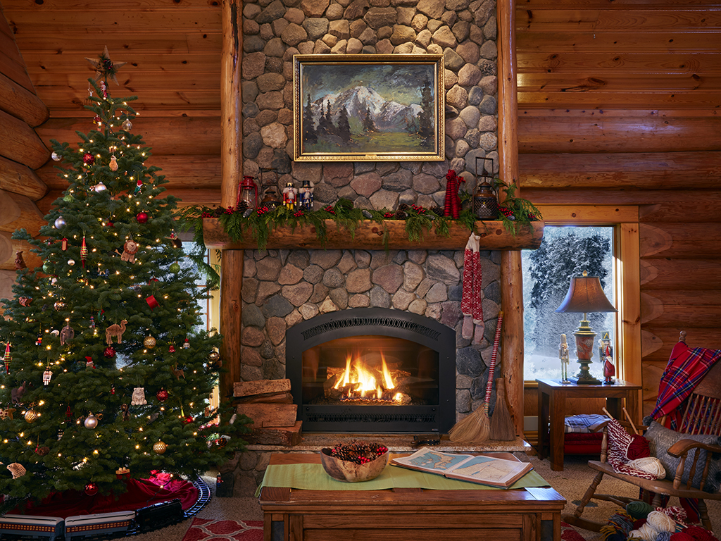 Love the stone fireplace in this beautiful log cabin kellyelko.com