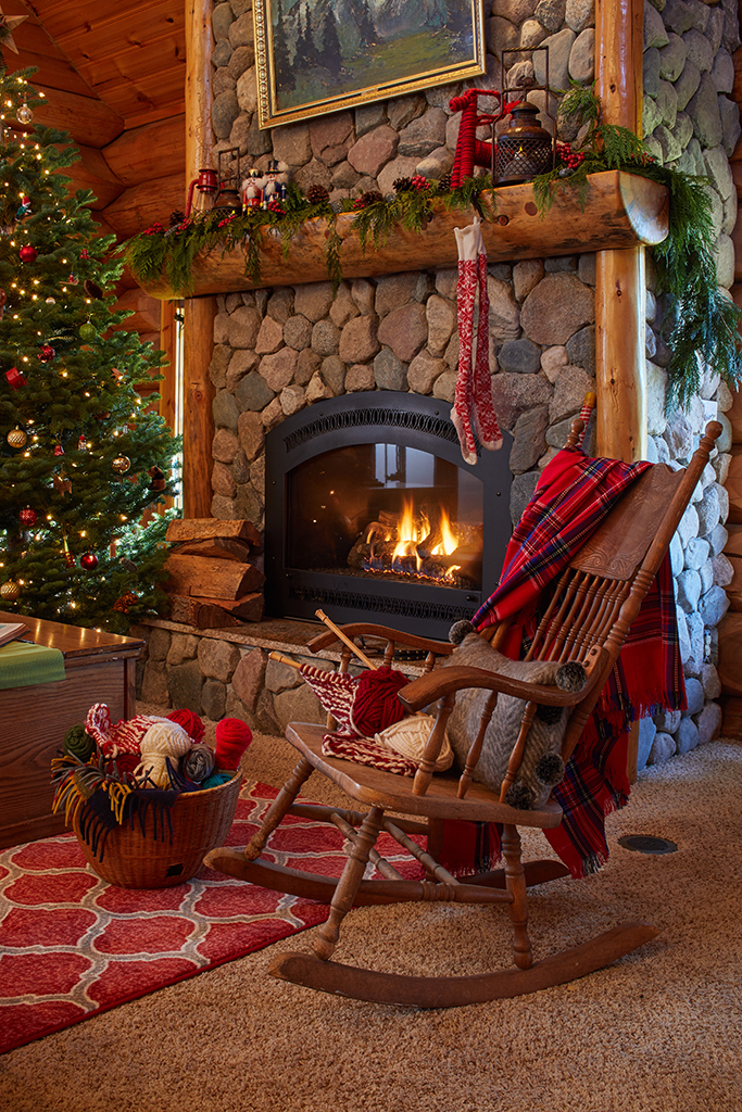 Beautiful stone fireplace with a roaring fire kellyelko.com