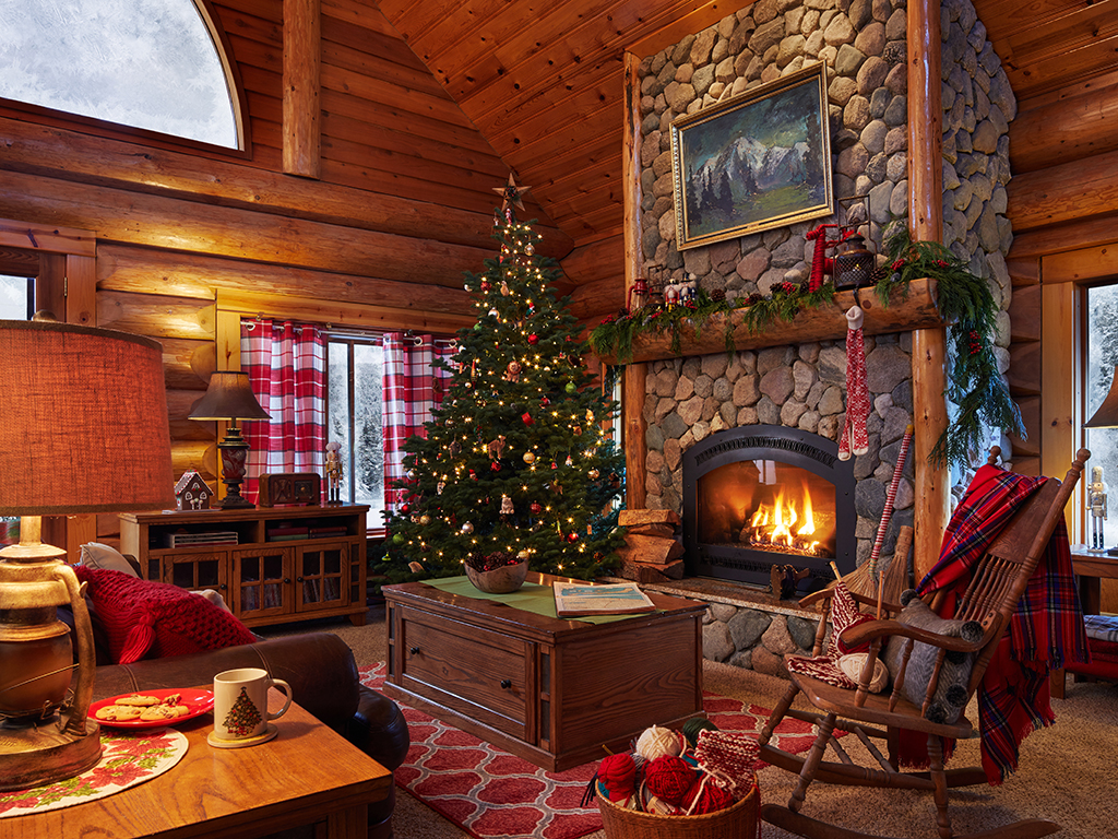 Santa Home Tour - step into this magical log cabin of Santa and Mrs. Claus kellyelko.com #santa #christmasdecor #christmashouse #santashouse #stonefireplace #cozyhome 