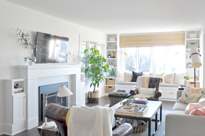 Living room centered around a fireplace - love the built in window seat