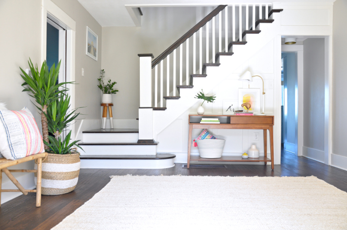 Colorful home tour - love this entryway and staircase kellyelko.com