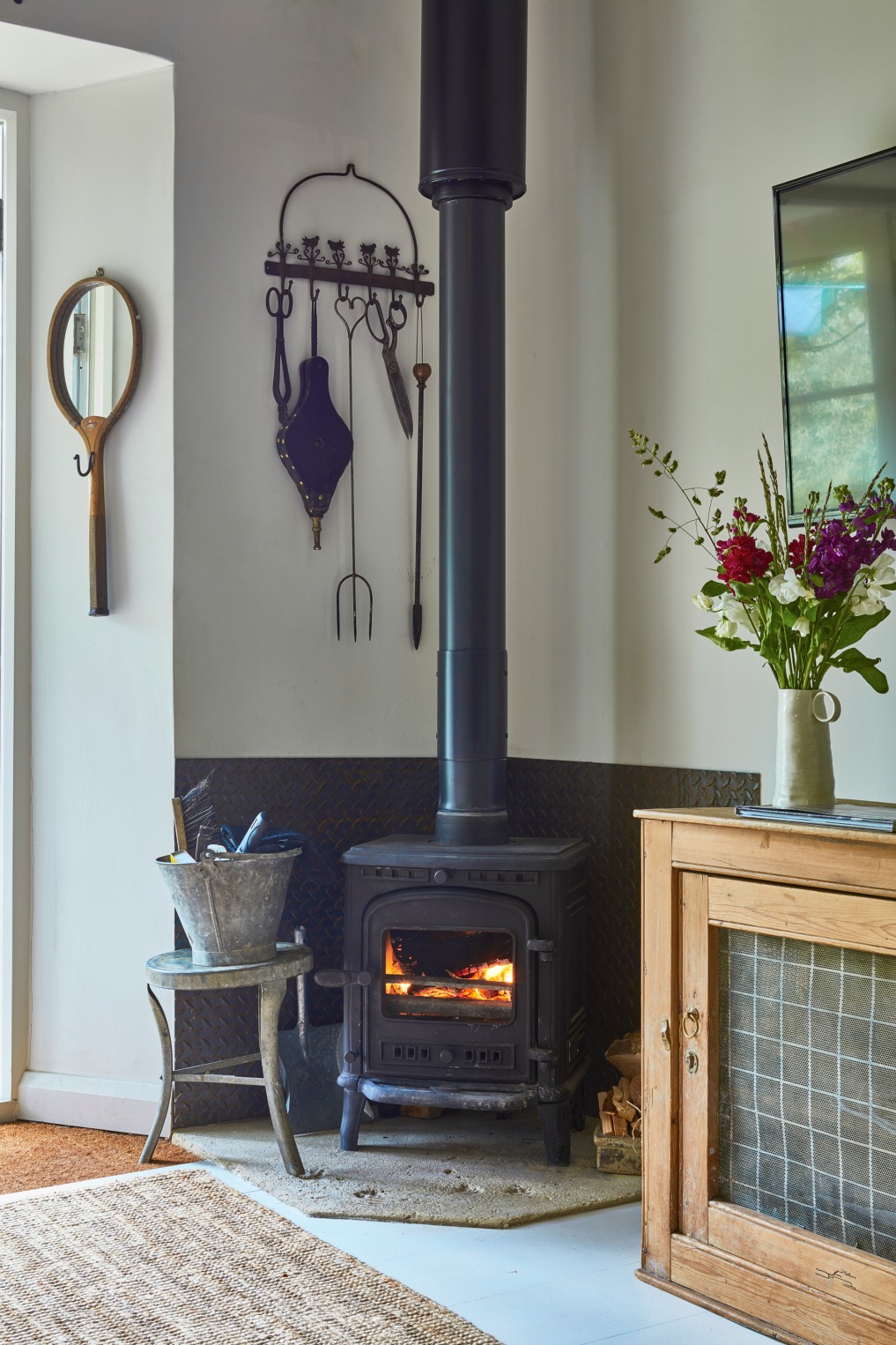 Wood burning stove in this charming cottage kellyelko.com