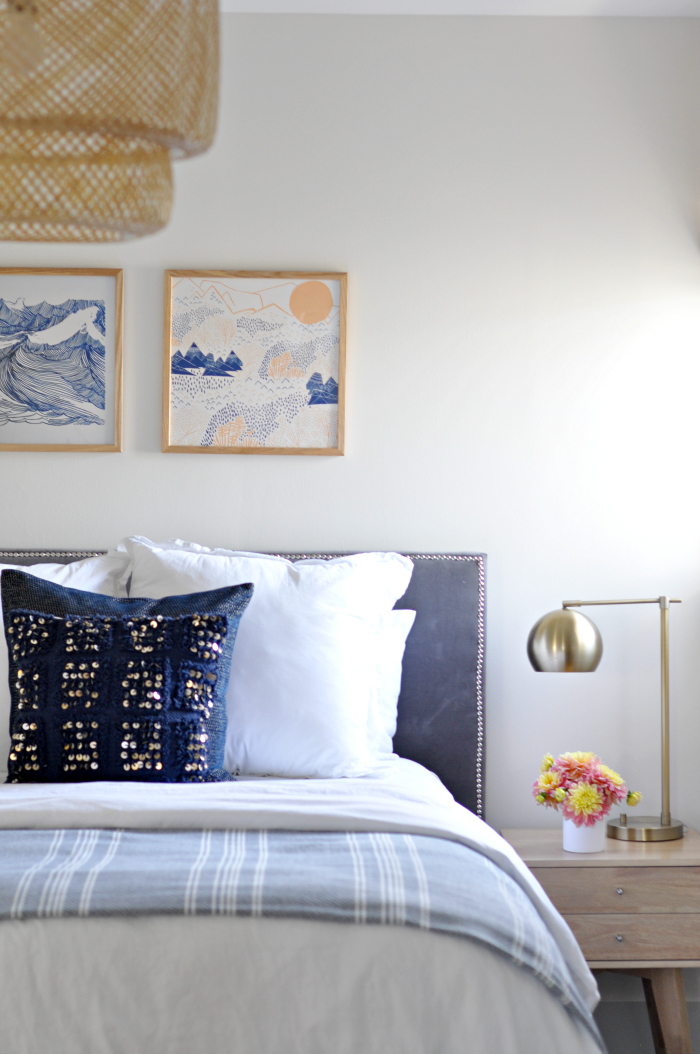 Serene bedroom with blue and brass accents