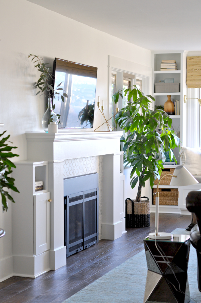 Love the fan shaped marble tile on the fireplace surround